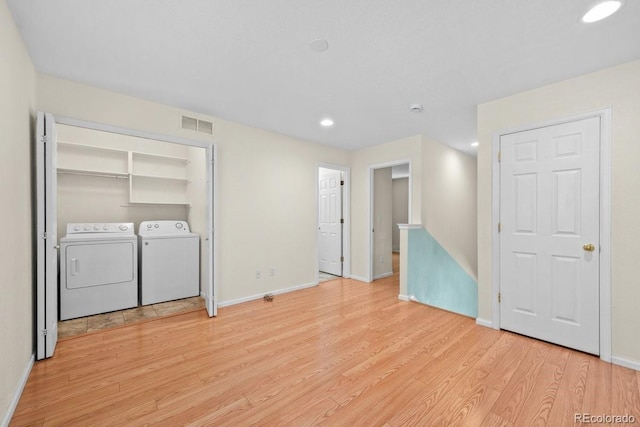 426 Plowman Way, Fort Collins, CO 80526 - laundry room with light wood-type flooring, washer and dryer, and recessed lighting