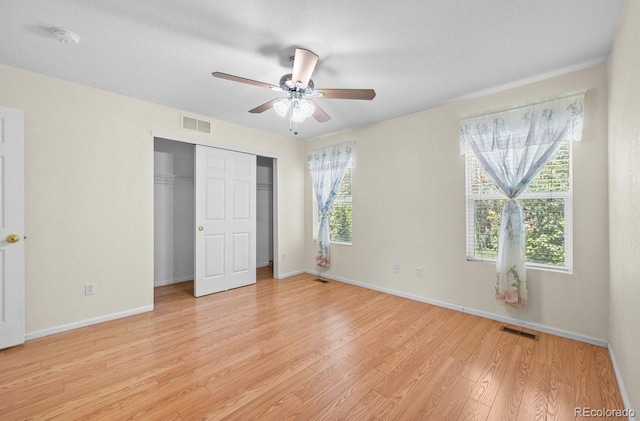 426 Plowman Way, Fort Collins, CO 80526 - unfurnished bedroom featuring light wood-style flooring, a closet, and ceiling fan
