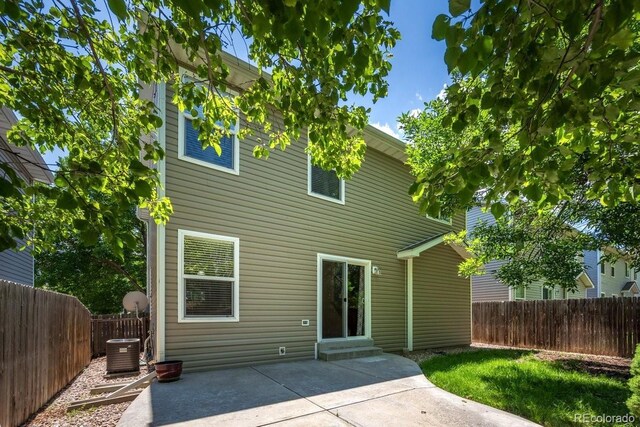 426 Plowman Way, Fort Collins, CO 80526 - rear view of house with a patio and a fenced backyard