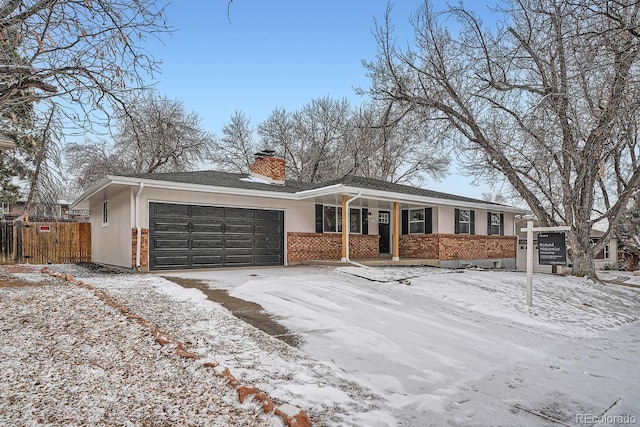 ranch-style home with a garage