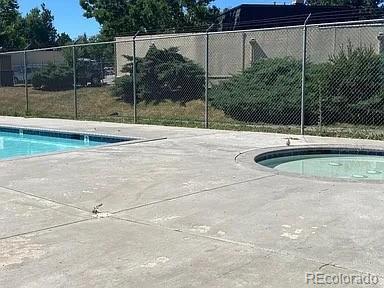 100 E Highline Cir Unit 105, Centennial, CO 80122 - community pool with fence and a patio area