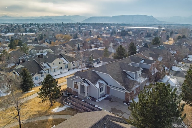 bird's eye view with a residential view and a mountain view