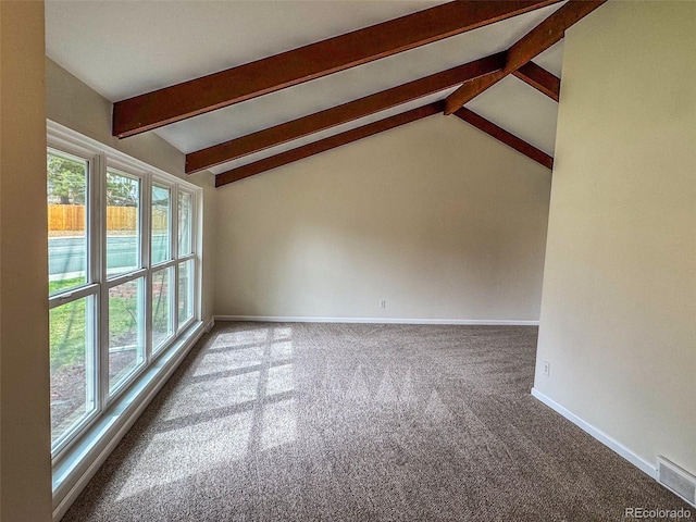 6640 S Heritage Pl W, Centennial, CO 80111 - carpeted spare room featuring visible vents, baseboards, and lofted ceiling with beams
