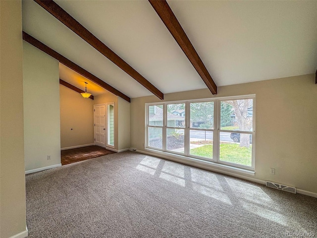 6640 S Heritage Pl W, Centennial, CO 80111 - unfurnished living room featuring carpet flooring, baseboards, vaulted ceiling with beams, and visible vents