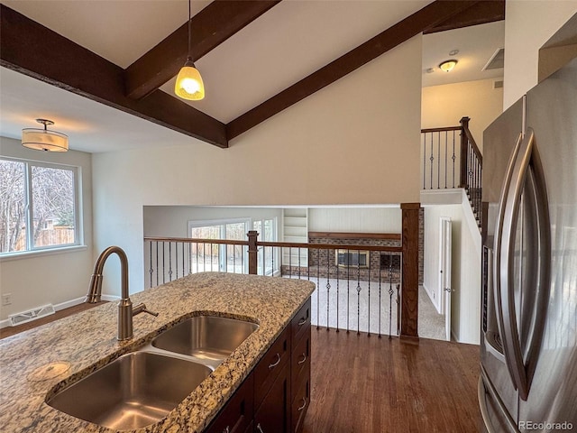 6640 S Heritage Pl W, Centennial, CO 80111 - kitchen with visible vents, stainless steel refrigerator with ice dispenser, decorative light fixtures, a sink, and dark wood finished floors