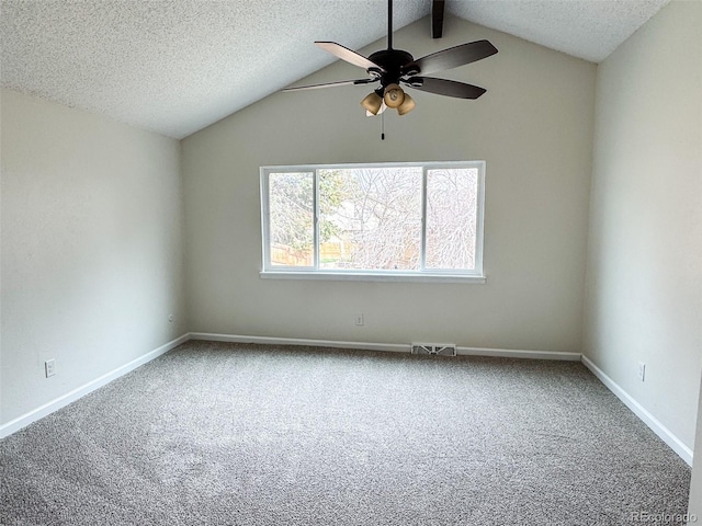 6640 S Heritage Pl W, Centennial, CO 80111 - empty room featuring a ceiling fan, carpet, lofted ceiling with beams, and a textured ceiling