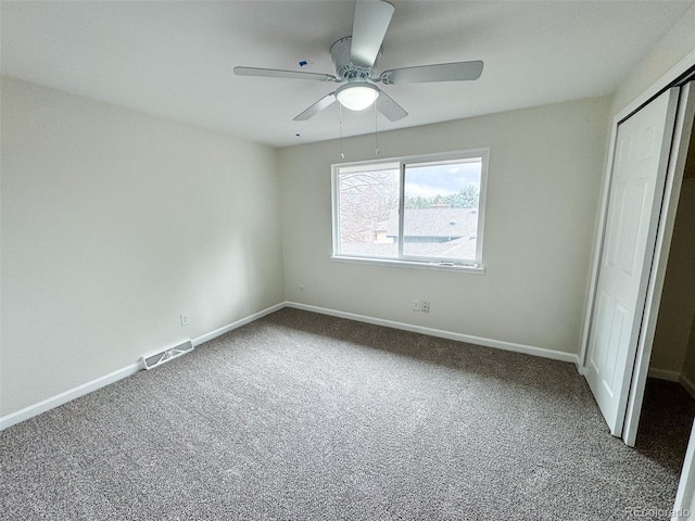 6640 S Heritage Pl W, Centennial, CO 80111 - unfurnished bedroom featuring ceiling fan, carpet, a closet, visible vents, and baseboards