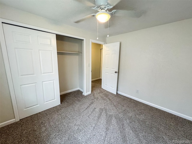 6640 S Heritage Pl W, Centennial, CO 80111 - unfurnished bedroom with a closet, baseboards, ceiling fan, a textured ceiling, and carpet flooring