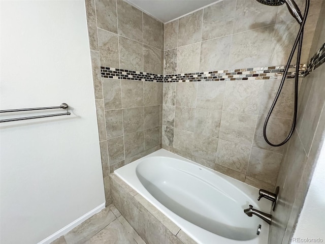 6640 S Heritage Pl W, Centennial, CO 80111 - full bathroom featuring tiled shower / bath and baseboards