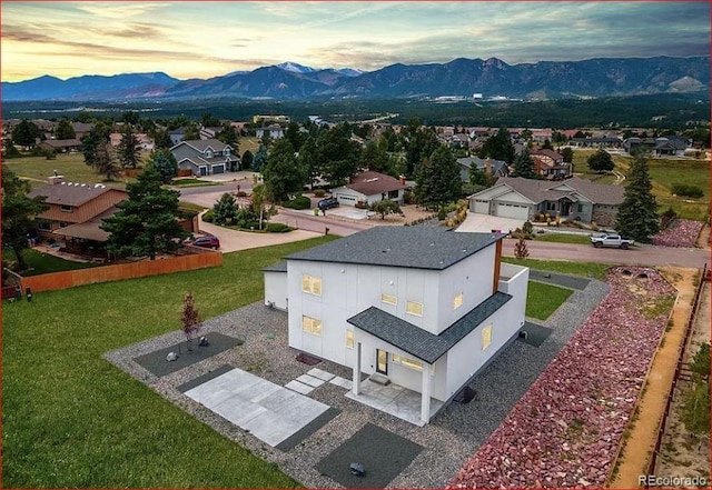 aerial view with a residential view and a mountain view