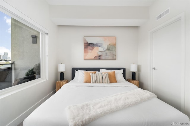 bedroom featuring visible vents