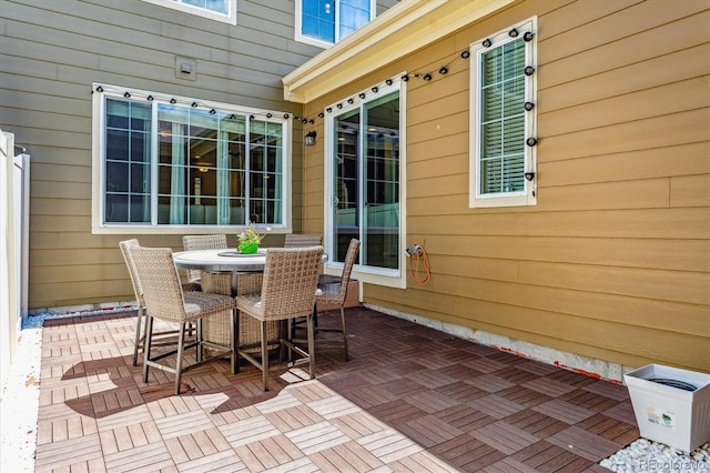 view of patio featuring outdoor dining area