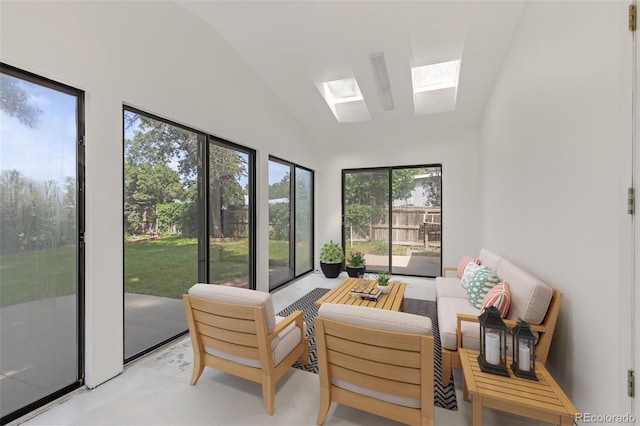 16839 E Amherst Ave E, Aurora, CO 80013 - sunroom / solarium with outdoor lounge area, a skylight, lofted ceiling, and finished concrete flooring