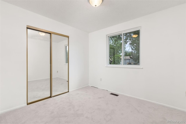 16839 E Amherst Ave E, Aurora, CO 80013 - unfurnished bedroom with carpet and a closet