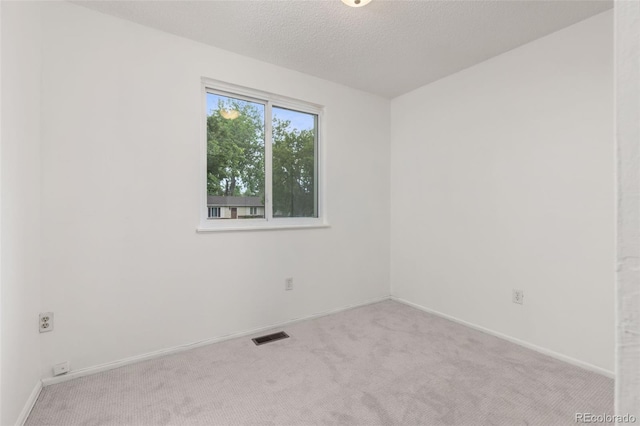 16839 E Amherst Ave E, Aurora, CO 80013 - unfurnished room with carpet floors and a textured ceiling