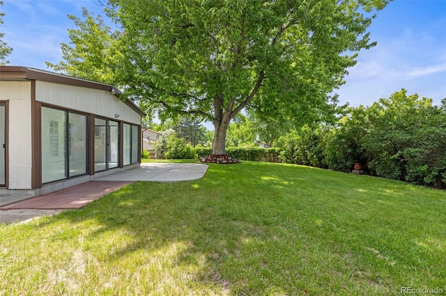 16839 E Amherst Ave E, Aurora, CO 80013 - view of green lawn featuring a patio