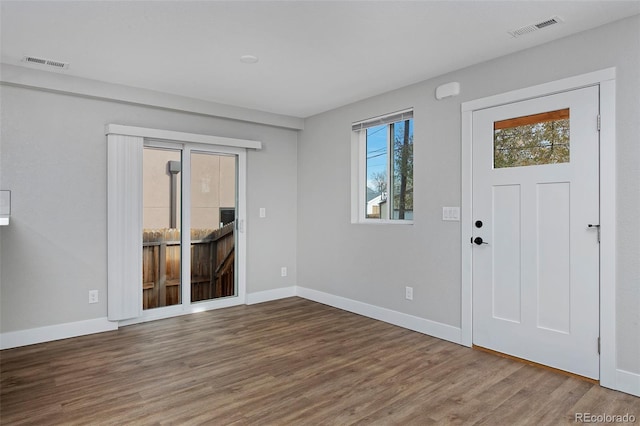 entrance foyer with hardwood / wood-style floors