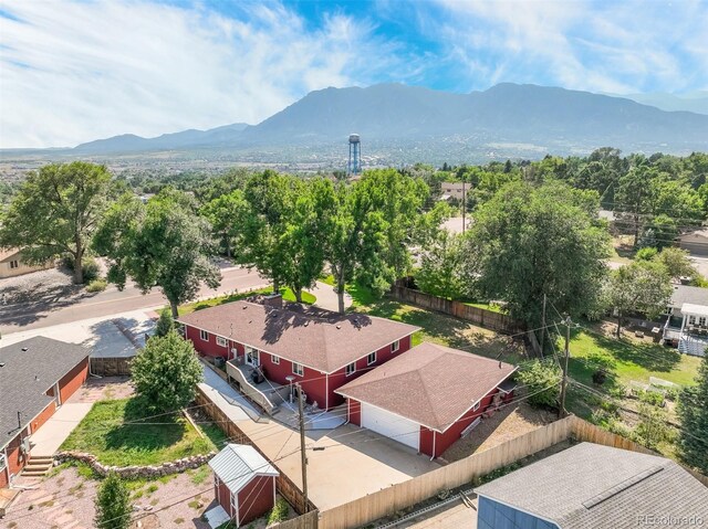 drone / aerial view featuring a mountain view