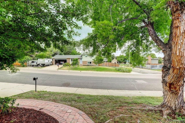 6640 S Dexter St, Centennial, CO 80121 - view of yard with concrete driveway