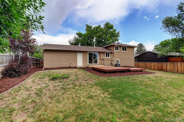 6640 S Dexter St, Centennial, CO 80121 - back of house with a fenced backyard and a deck
