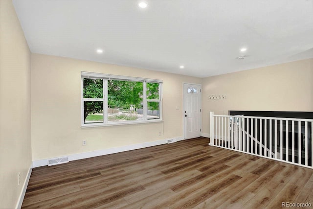 6640 S Dexter St, Centennial, CO 80121 - empty room featuring wood finished floors and recessed lighting