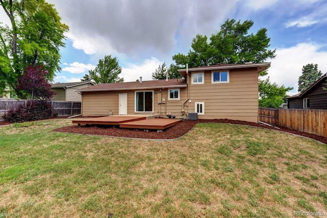 6640 S Dexter St, Centennial, CO 80121 - back of house with a fenced backyard and a wooden deck