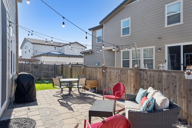 view of patio / terrace featuring an outdoor living space and area for grilling