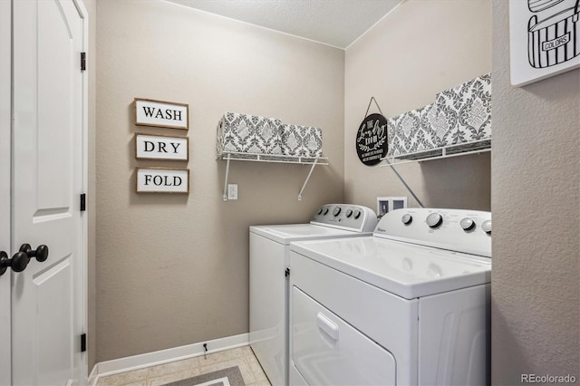 laundry room with washer and clothes dryer