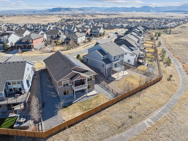 aerial view with a mountain view and a residential view