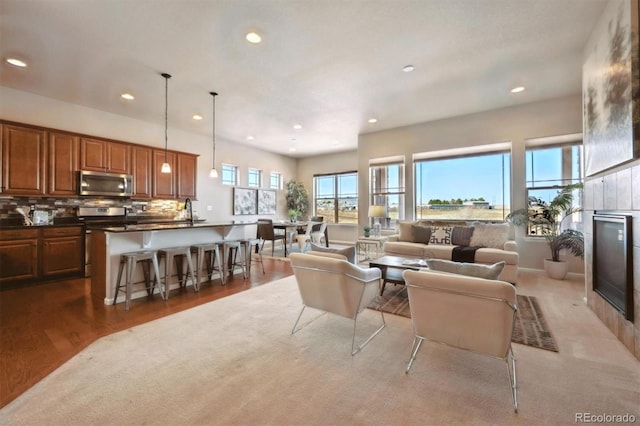 living room featuring wood finished floors and recessed lighting