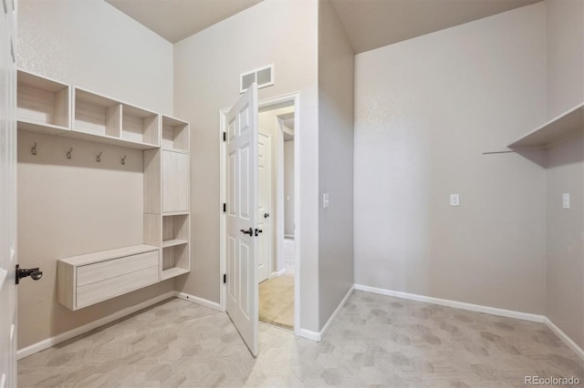 interior space featuring visible vents and baseboards