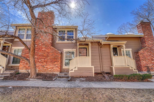 view of front of property featuring a chimney