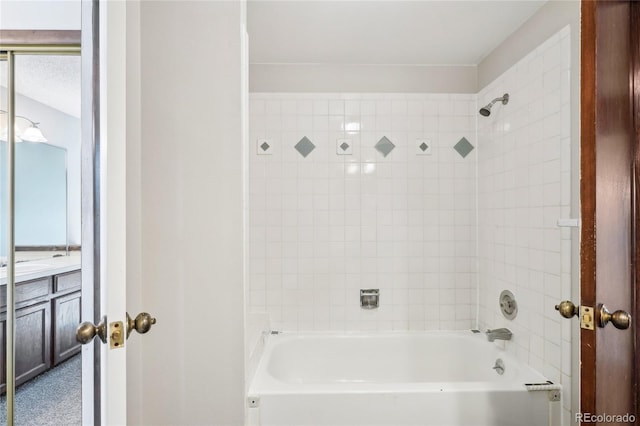 bathroom featuring vanity and shower / washtub combination