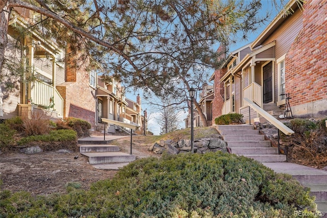 view of community with stairway