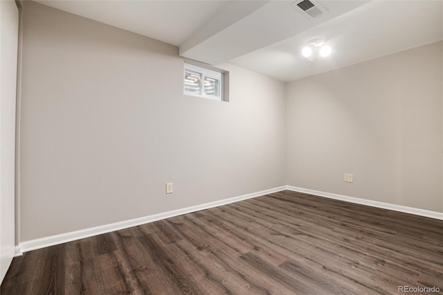 basement featuring hardwood / wood-style floors