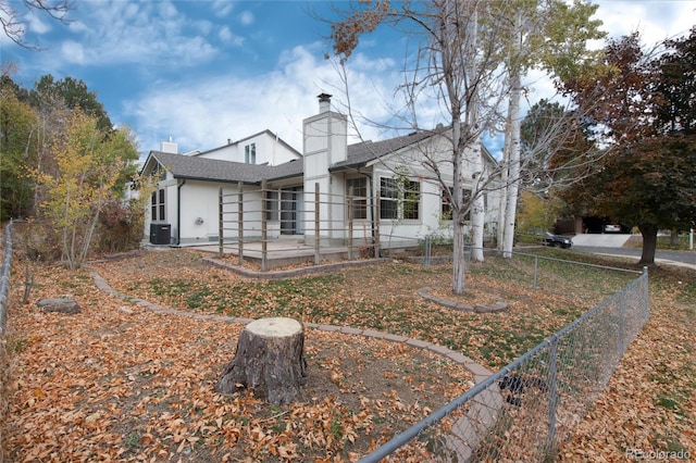 back of property with central air condition unit