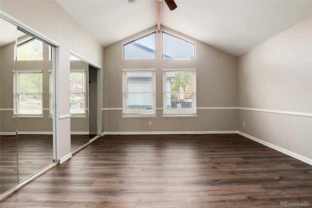 unfurnished room featuring high vaulted ceiling, dark wood-type flooring, and ceiling fan