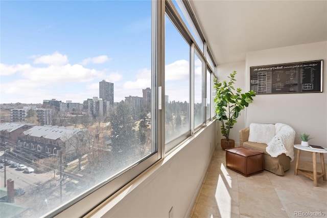 sunroom / solarium with a city view