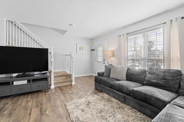 living room with light hardwood / wood-style flooring