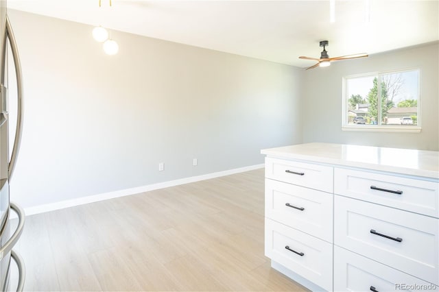 10932 W 107th Ave, Broomfield, CO 80021 - interior space featuring light wood finished floors and ceiling fan