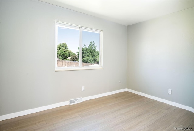 10932 W 107th Ave, Broomfield, CO 80021 - empty room featuring light wood finished floors and baseboards