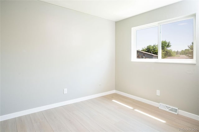 10932 W 107th Ave, Broomfield, CO 80021 - unfurnished room featuring light wood-style flooring and baseboards