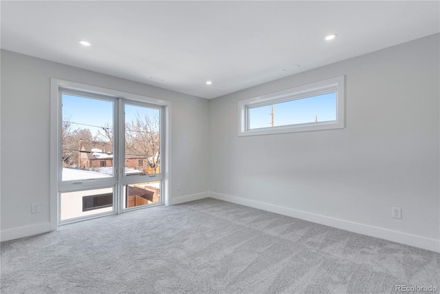 view of carpeted spare room