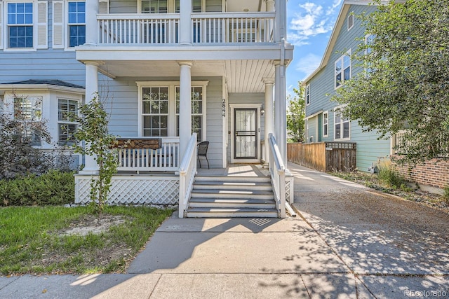 doorway to property featuring a balcony