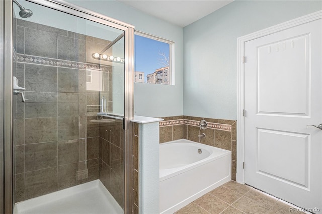9039 E Panorama Cir Unit C201, Englewood, CO 80112 - full bath with a bath, a stall shower, and tile patterned floors