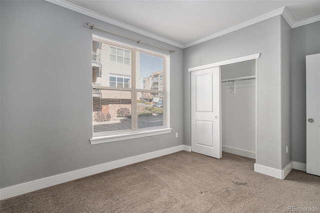9039 E Panorama Cir Unit C201, Englewood, CO 80112 - unfurnished bedroom with ornamental molding, carpet floors, and a closet