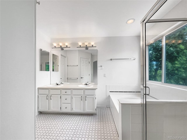5005 W 128th Pl, Broomfield, CO 80020 - full bathroom featuring double vanity and a bath