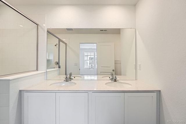 15267 Fillmore St, Thornton, CO 80602 - full bathroom featuring a shower stall and double vanity