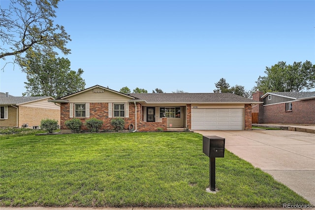 678 S Oswego Ct, Aurora, CO 80012 - single story home with concrete driveway, brick siding, an attached garage, and a front lawn