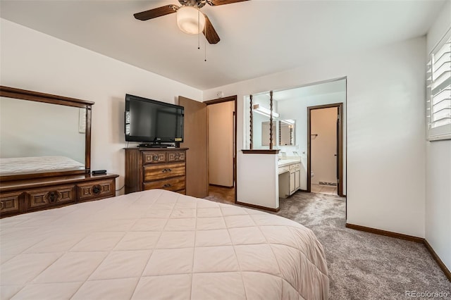 678 S Oswego Ct, Aurora, CO 80012 - carpeted bedroom with ceiling fan, connected bathroom, and baseboards